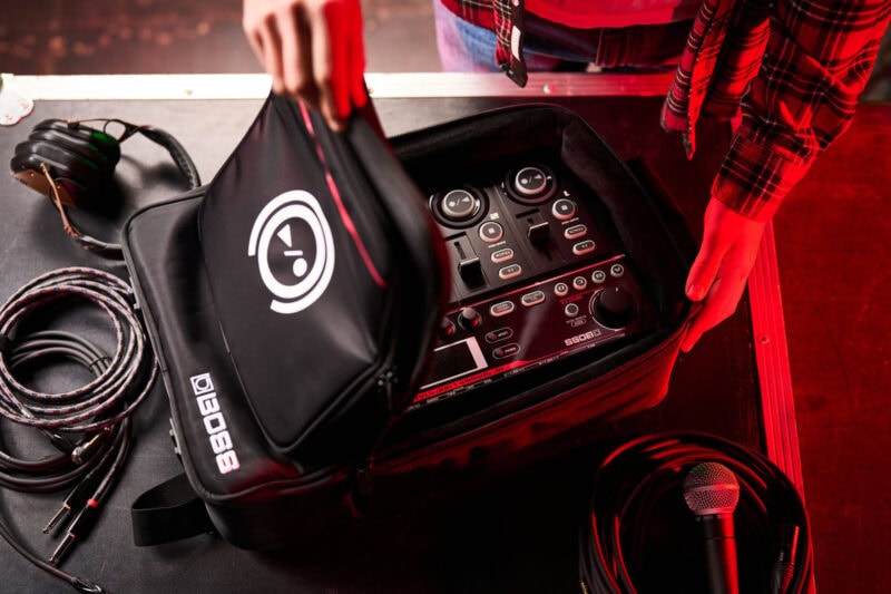 High-quality DJ audio equipment set up for performances, including a mixer, microphone, headphones, and cables at The Music Outlet in Swords, Dublin.